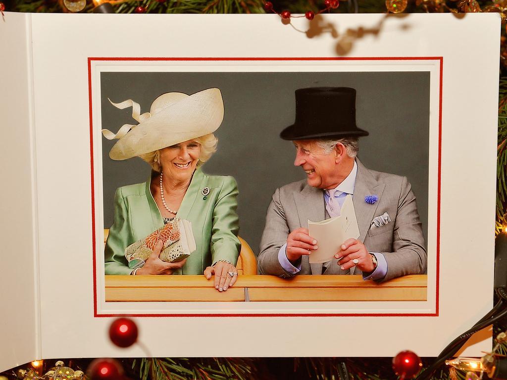 2013: Charles and his wife giggled together in the photo on their Christmas card.