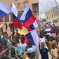 Protesters flying Russian flags on the streets of Kano. [X, formerly Twitter]