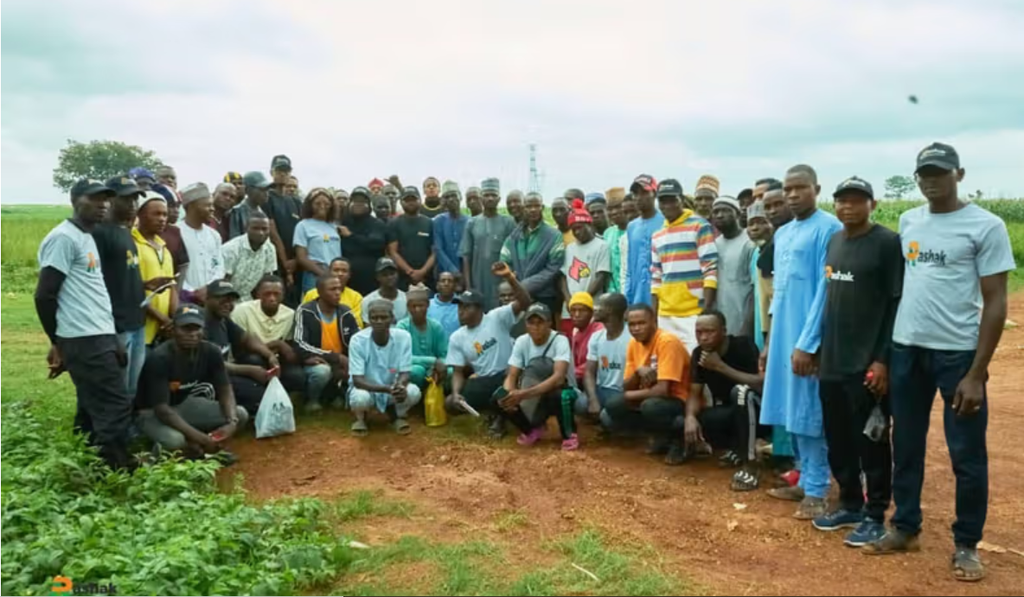 Rashak Farms staff and group of farmers. [Business Insider Africa]