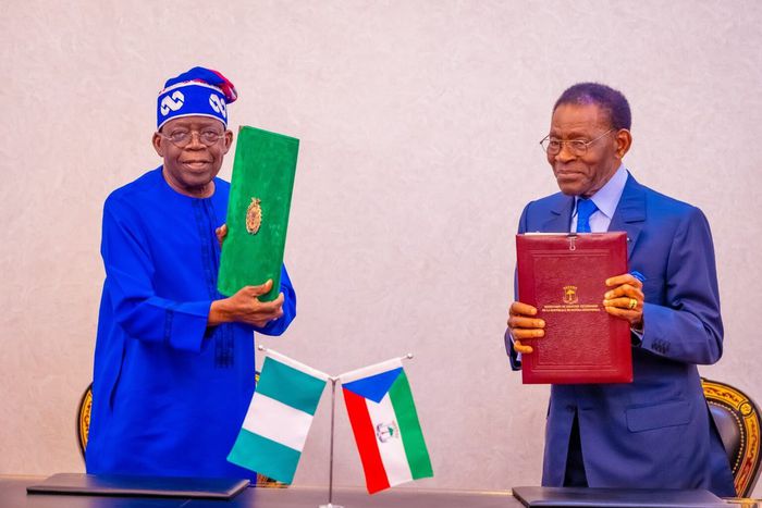 President Bola Tinubu and Equatorial Guinea President, Teodoro Mbasogo, displaying  agreement on Gulf of Guinea Pipeline Project signed on Wednesday in Malabo [NAN]