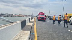 Officials of the Federal Road Safety Corps controlling traffic following an accident on the Third Mainland Bridge. (Channels TV)
