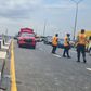 Officials of the Federal Road Safety Corps controlling traffic following an accident on the Third Mainland Bridge. (Channels TV)