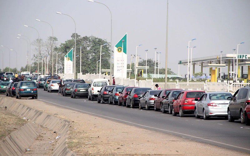 A long queue at a fuel station in Abuja as Nigerians grapple with petrol scarcity. [Daily Trust]