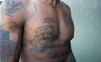 A Nigerian man with tattoo