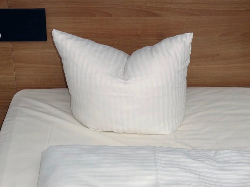 The German "crumple pillow" baffles many foreign travelers who just want a good night's sleep.Kypros/Getty Images