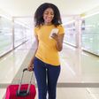 Black woman at the airport [iStock]