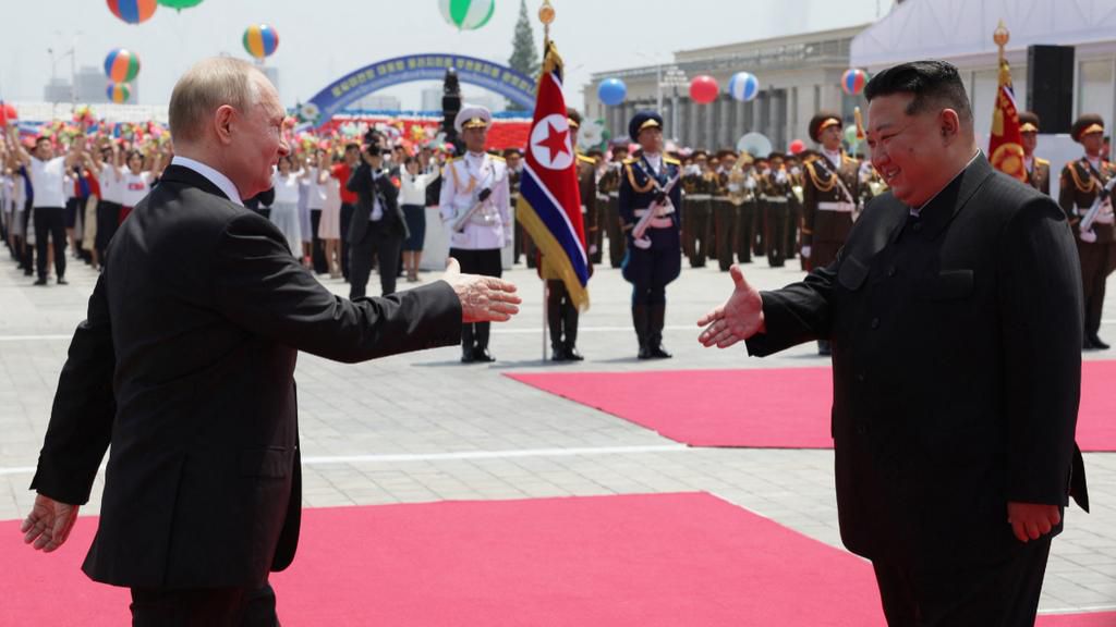 North Korea's leader Kim Jong Un (R) shakes hands with Russian President Vladimir Putin during a welcoming ceremony at Kim Il Sung Square in Pyongyang on June 19, 2024. [Getty Images]