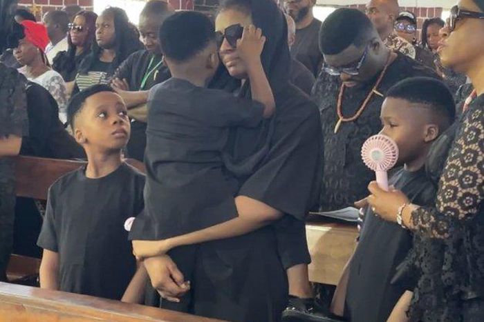 Junior Pope's wife Jennifer and their three sons [X/YungElijah]