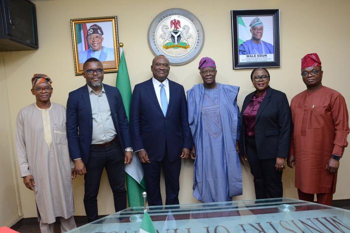 L-R: Director, Abuja Liaison Office, Manufacturers Association of Nigeria (MAN), Adeyemi Folorunsho; Customer Development Director, Unilever Nigeria, Mike Ubeh; Ag. Chairman Board of Directors, Unilever Nigeria, Micheal Ikpoki; The Honourable Minister ...