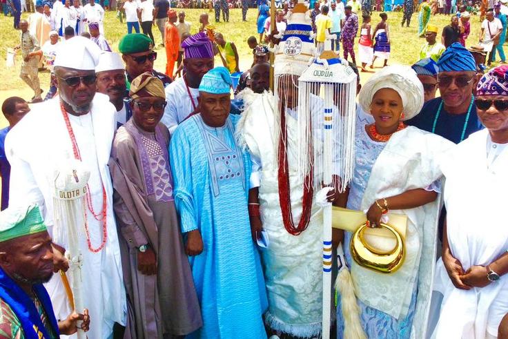 Middle: The monarch, Oba Olusola Idris Adebowale Lamidi-Osolo and his wife, Olori Taibat Osolo during the staff of office presentation ceremony. [Pulse]
