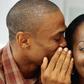 Man whispering to woman's ear(citinewsroom)
