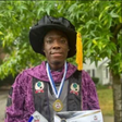Emmanuel Ahmadu, a Nigerian graduate in a photograph displaying his two honorary doctorate degrees in United States of America [NAN]