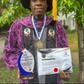 Emmanuel Ahmadu, a Nigerian graduate in a photograph displaying his two honorary doctorate degrees in United States of America [NAN]