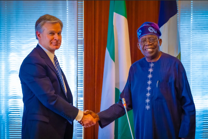 President Bola Tinubu and FBO Director, Christopher Asher Wray [Presidency]
