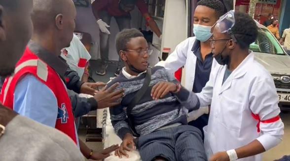 Medics helping an injured protestor
