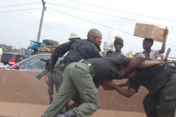 Police officers fighting in Lagos.