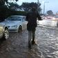 Heavy traffic on a Kenyan road during the rainy season
