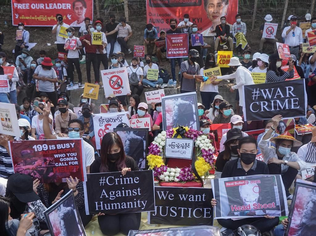 Protesters against the Myanmar military coup outside the US Embassy in Yangon on February 20, 2021.