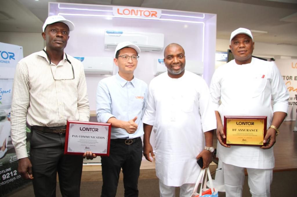 L-R:  Nkili Augustine,  General Manager, Pax Communications Limited;  Wei Xiaowen, Managing Director, Lontor Hi-Tech Development Company Limited;  Nwabueze Desmond, Chairman, Desired Olive limited; and Okechukwu Christian, CEO,  DT Assurance at the Lon...