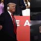 US former President and 2024 Republican presidential candidate Donald Trump, a bandage on his ear after being wounded in an assassination attempt, attends the first day of the 2024 Republican National Convention at the Fiserv Forum in Milwaukee, Wiscon...