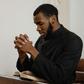 A religious man praying solemnly [Image Credit: Mart Production]