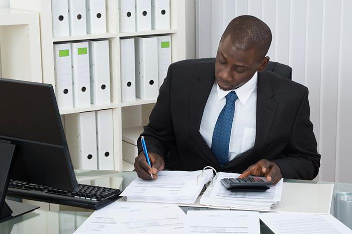 Image of a male accountant [ALIS - Government of Alberta]