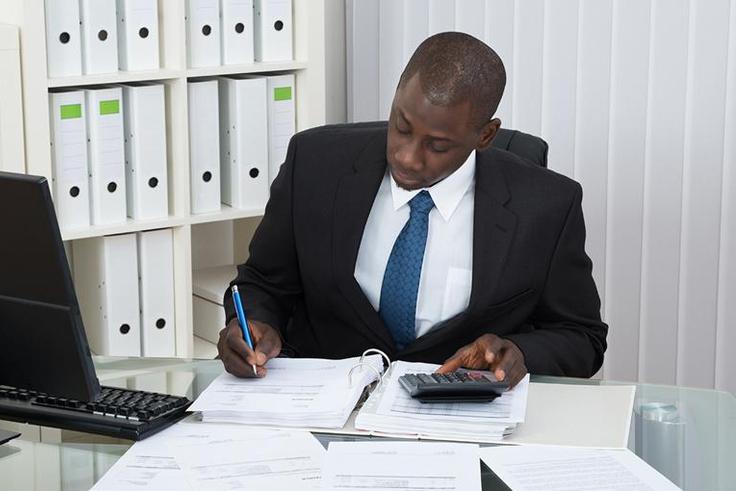 Image of a male accountant [ALIS - Government of Alberta]