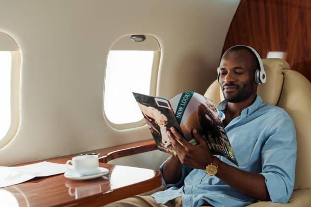 Black man inside an airplane [iStock]