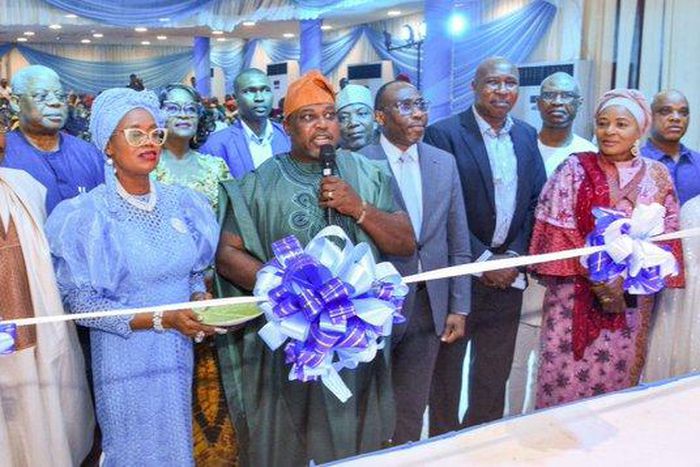 The SGF’s representative, Prof. Babatunde Bolaji, unveils new SLTV Satellite network in Abuja on Thursday. [NAN]