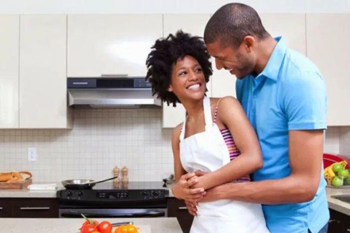 Happy couple cooking together