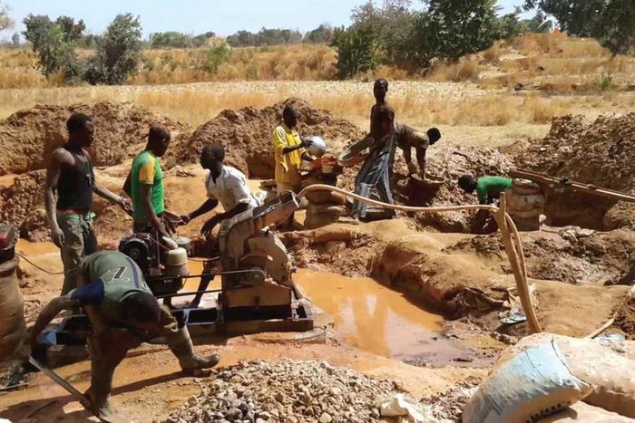 Miners working on a mining site in Zamfara state [guardian]