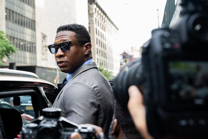Jonathan Majors, looks backs at reporters while leaving Manhattan Criminal court after a pre-trial hearing in August 2023.Alexi Rosenfeld/Getty Images