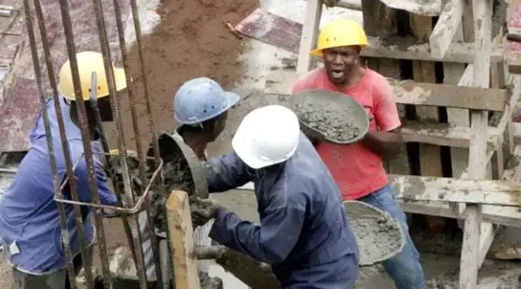 Men working in a mjengo site