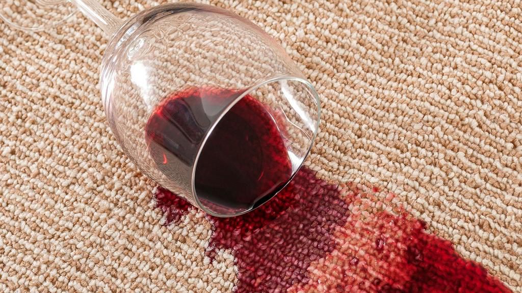 Red wine stain on carpet [iStock]