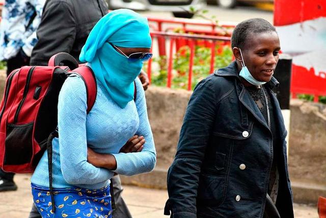 Poeple keeping warm during the Nairobi weather