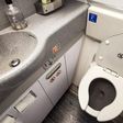 Airplane toilet [Shutterstock-bookzv]