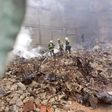 P.S LASEMA, Dr Olufemi Oke- Osanyintolu, supervising the carting away of rubbles from the scene of Dosunmu fire incident [NAN]