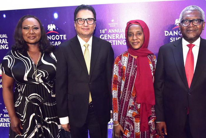 L-R: Company Secretary/Legal Adviser, Dangote Sugar Refinery Plc, Temitope Hassan; Group Managing Director/CEO, Dangote Sugar Refinery Plc, Ravindra Singhvi ; Executive Director, Dangote Sugar Refinery Plc, Mariya Aliko Dangote; and Chairman, Dangote S...