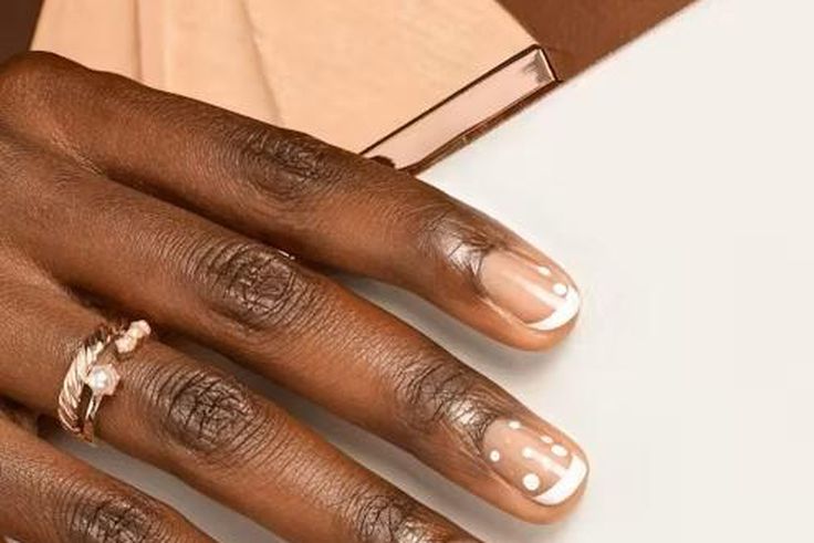 Nude doesn't have to mean boring! (Negative space nail art) [The Zoe Report]