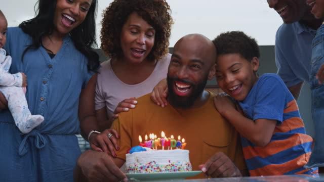 Celebrating birthday with loved ones [iStock]