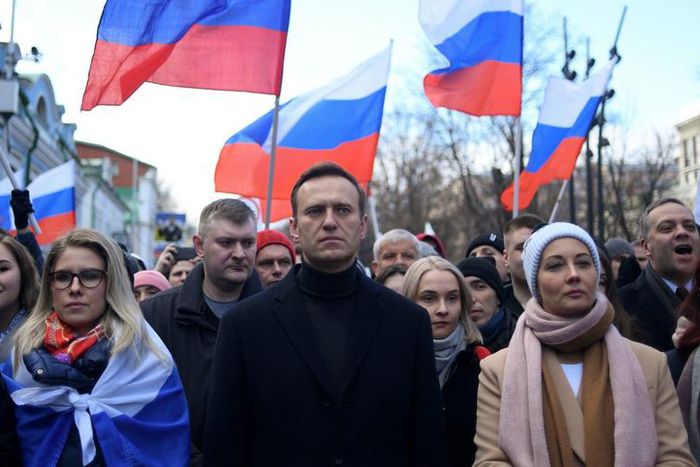 Russian opposition leader Alexei Navalny and his wife Yulia walk with demonstrators during a 2020 march in memory of murdered Kremlin critic Boris Nemtsov in downtown Moscow. He suffered a life-threatening poisoning months later, in August 2020.KIRILL ...