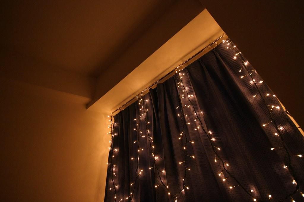 View of bedroom window with fairy lights