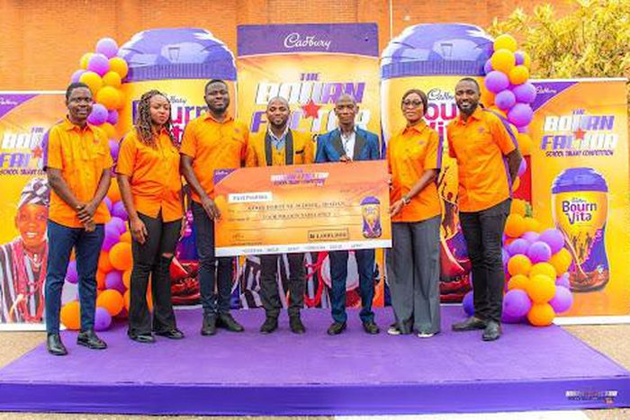 L-R: Brand Manager, Cocoa beverages, Cadbury Ghana Plc, Godfred Mawugbe; Head of Marketing for Cadbury West Africa, Morolake Emokpaire; Brand Manager, Beverages and Biscuits, Cadbury Nigeria Plc, Michael Boateng; Representatives of Good Fortune School ...