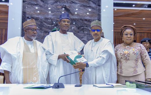 Minister of Education, Prof. Tahir Mamman, receiving the report of an inter-ministerial committee on Friday.  [Twitter:@ProfTahirMamman]