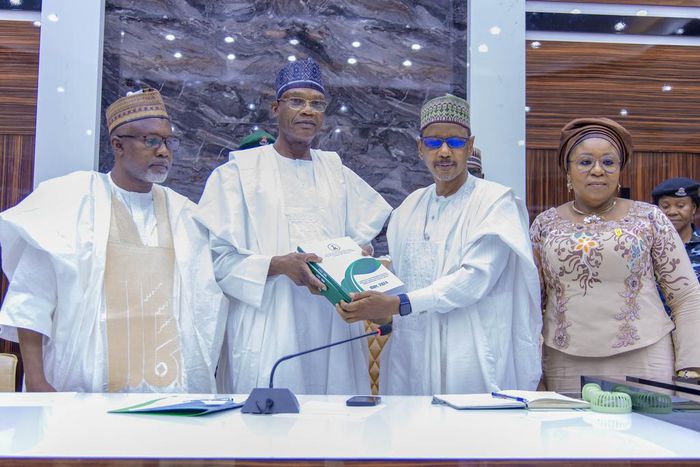 Minister of Education, Prof. Tahir Mamman, receiving the report of an inter-ministerial committee on Friday.  [Twitter:@ProfTahirMamman]