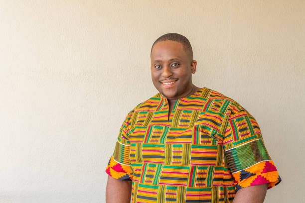 A man in traditional outfit with patterns