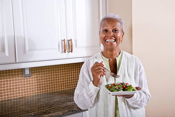 Old Woman eating [iStock]
