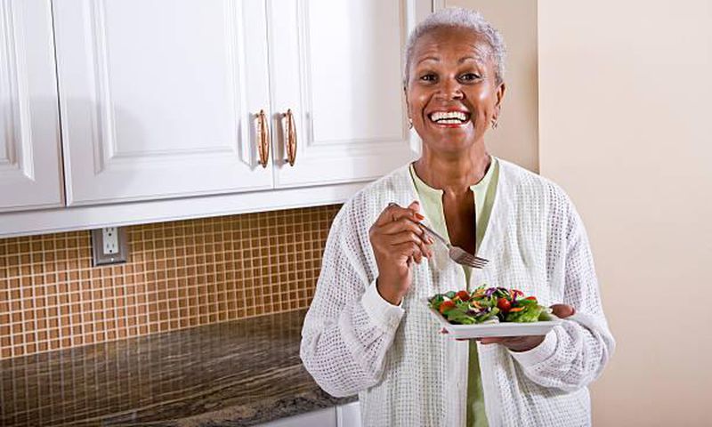 Old Woman eating [iStock]