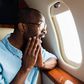 Black man on a plane [VistaFree]