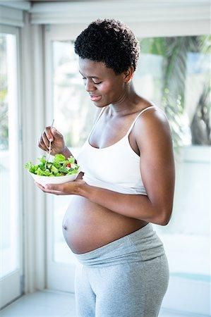 Most pregnant women only need about 300 extra calories per day [Masterfile]